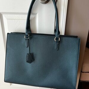 Never used. Briefcase bag.